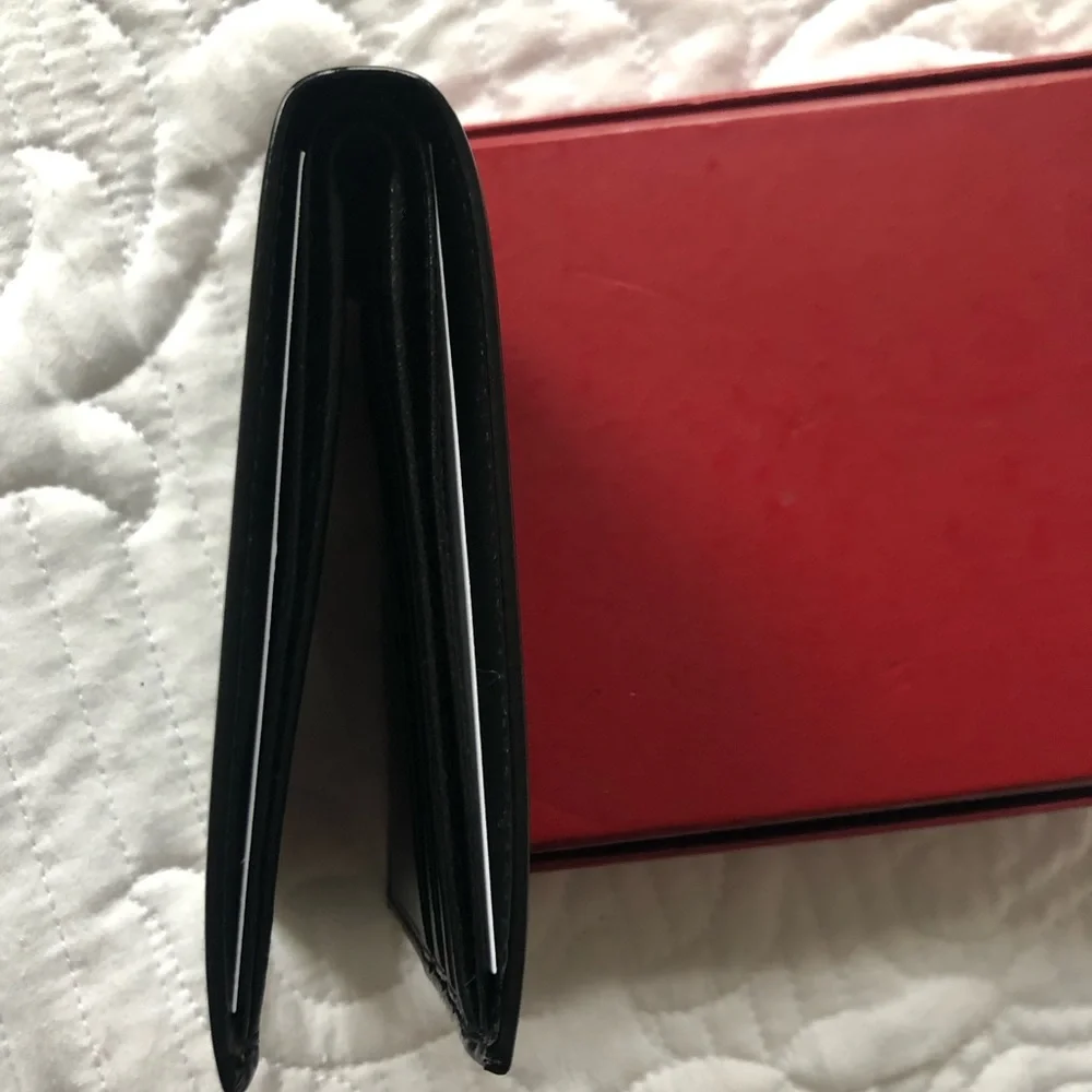 Authentic Salvatore Ferragamo Black Leather wallet - Picture 9 of 11